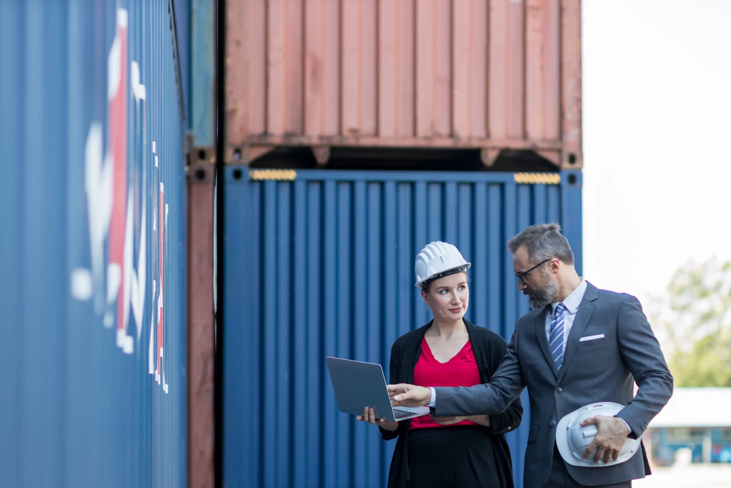 2-businessman-and-secretary-work-at-container-cargo-2025-03-18-13-59-26-utc-scaled